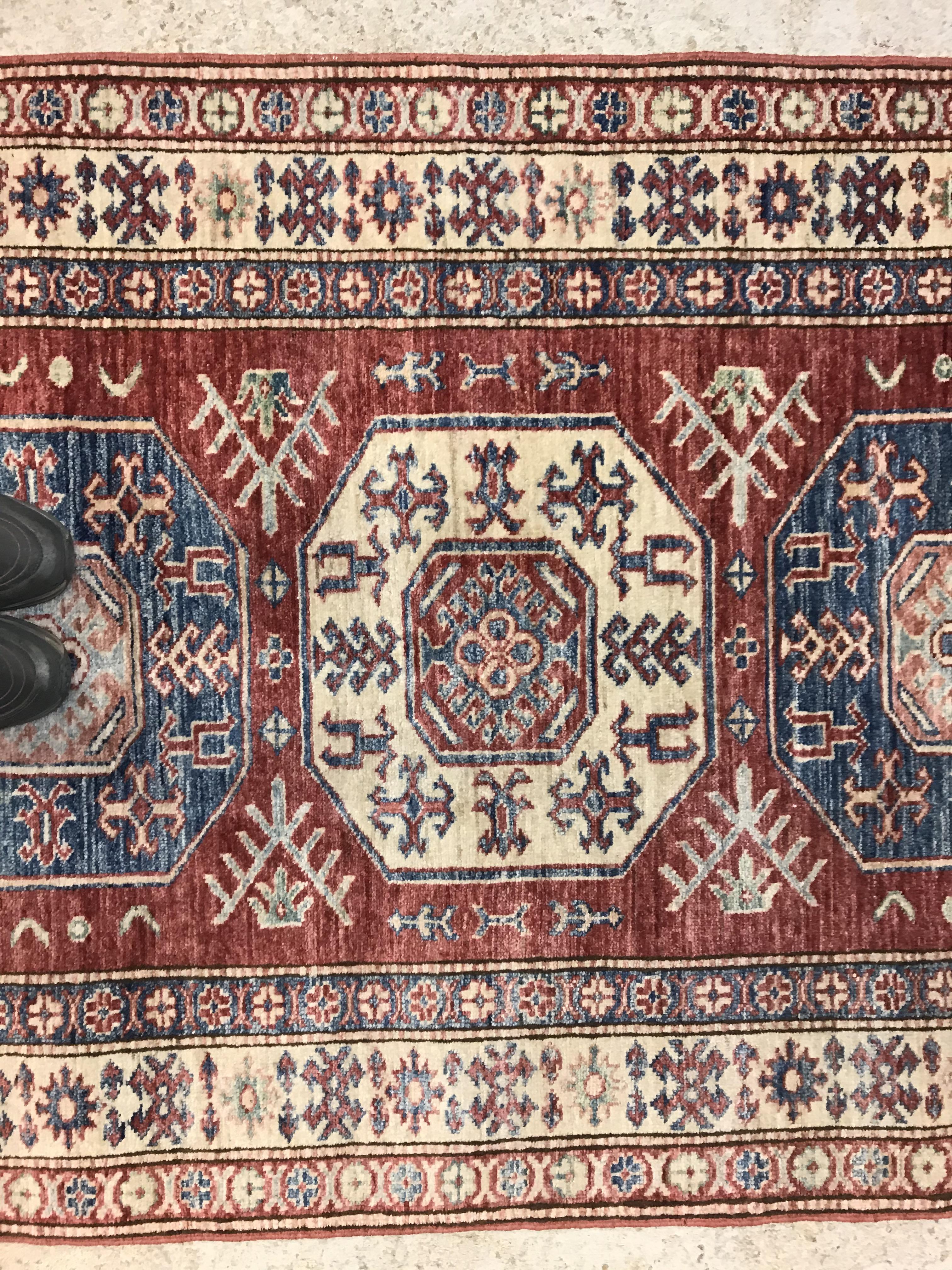 A modern Persian rug, the central panel set with three repeating medallions on a red ground, - Image 3 of 9