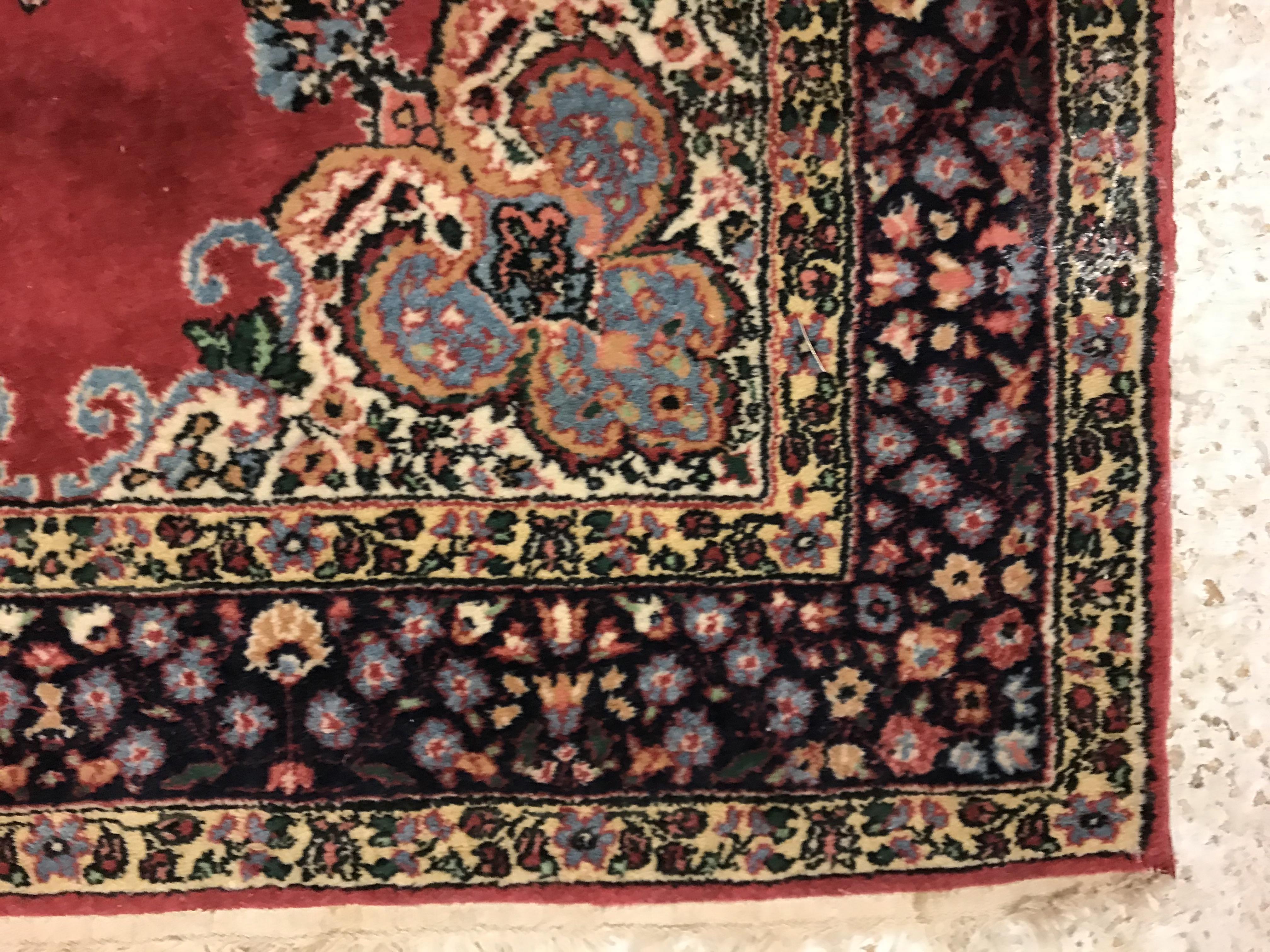 A pair of fine Oriental rugs, the central panels set with floral decorated circular medallion on a - Image 18 of 41