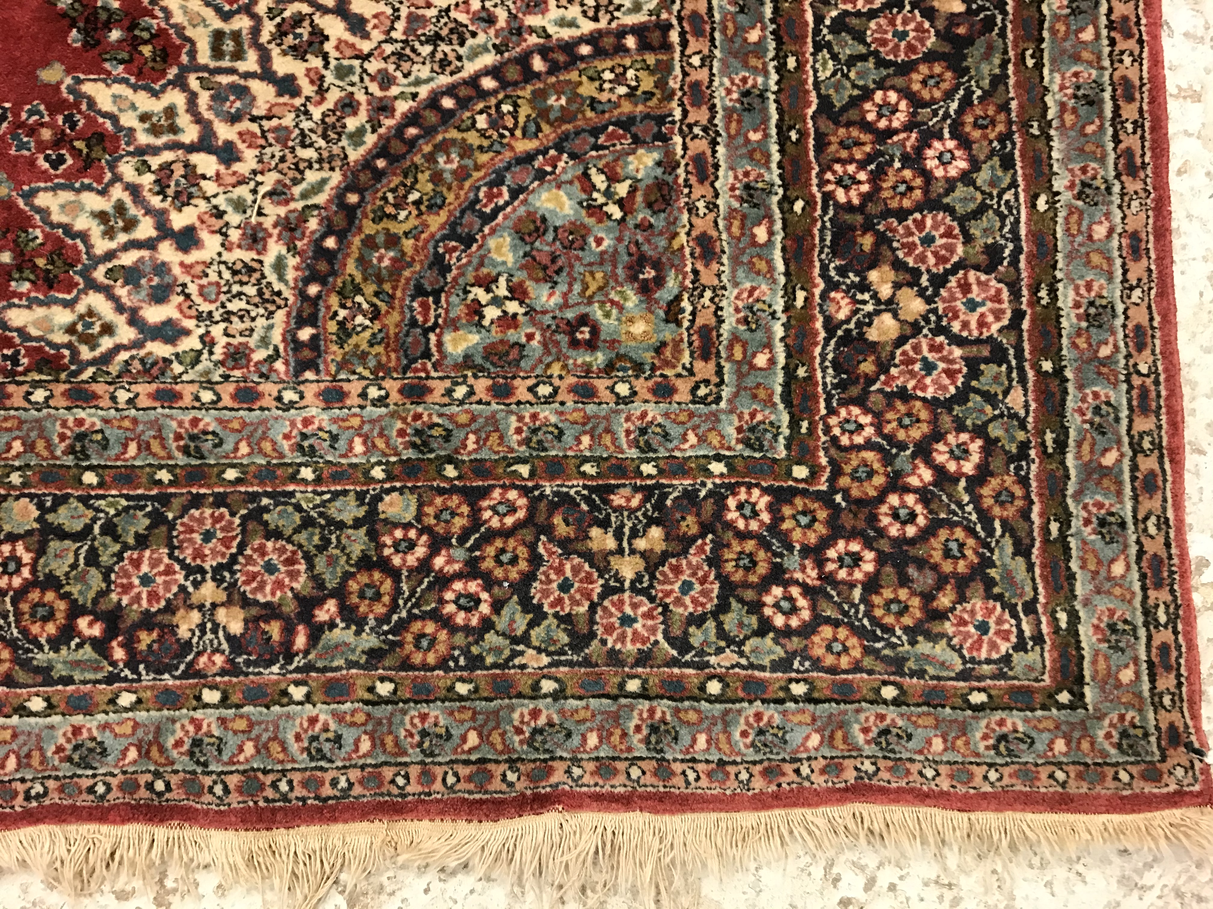 A pair of fine Oriental rugs, the central panel set with floral decorated circular medallion on a - Image 35 of 48