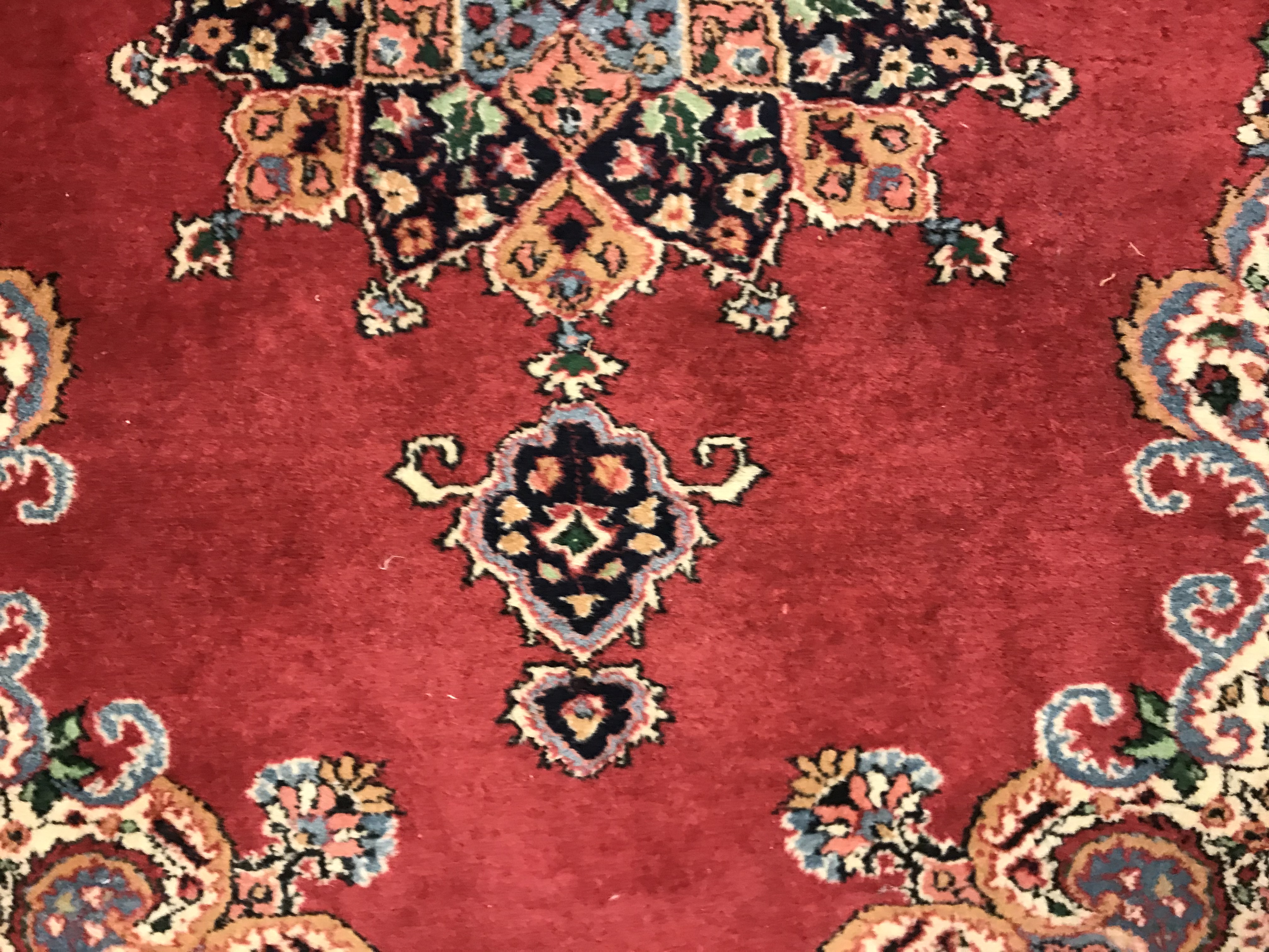 A pair of fine Oriental rugs, the central panels set with floral decorated circular medallion on a - Image 30 of 41