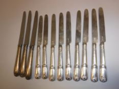 A set of nine George III silver bladed knives with silver sheathed handles (blades by Moses Brent,