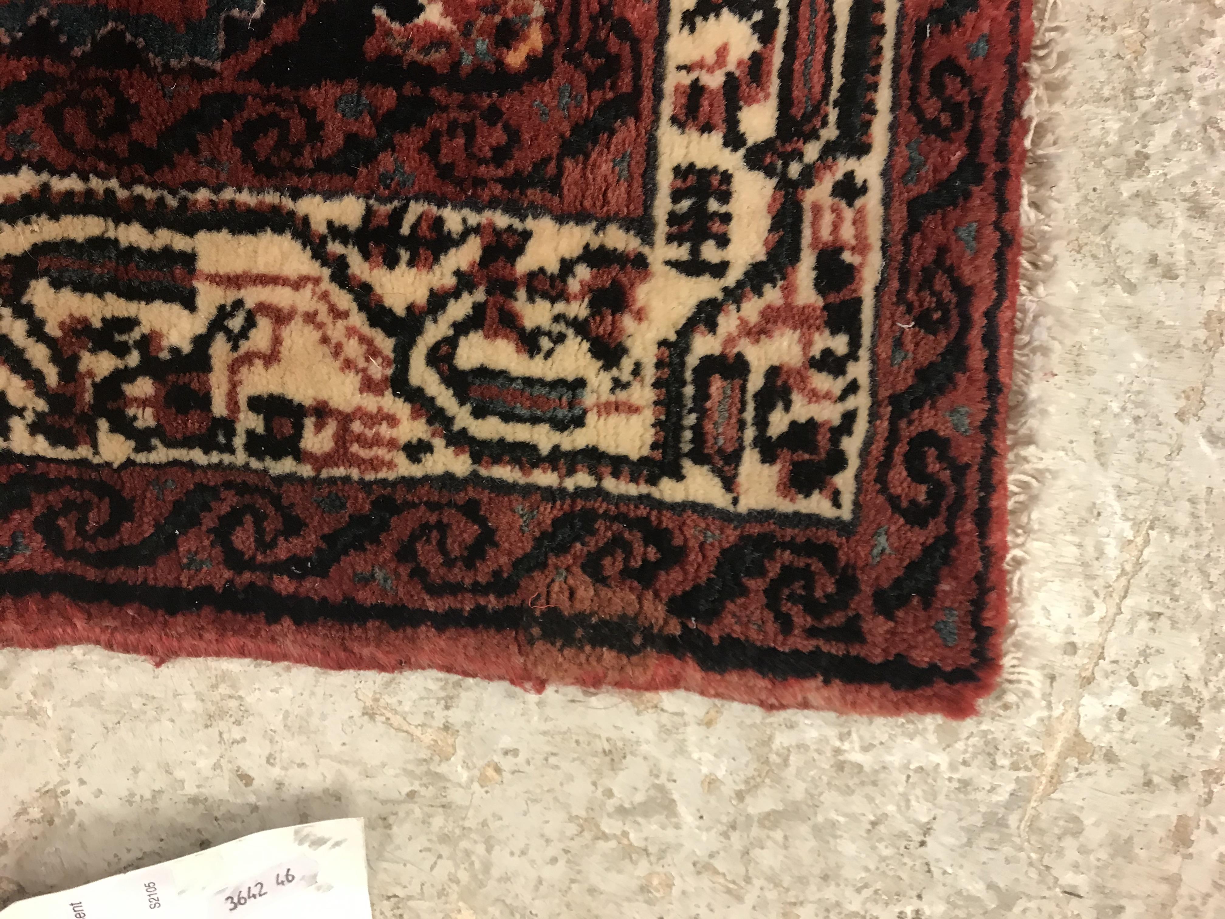 A modern Persian (Iran) runner, the red ground with repeating lozenge medallion with hook style - Image 19 of 23