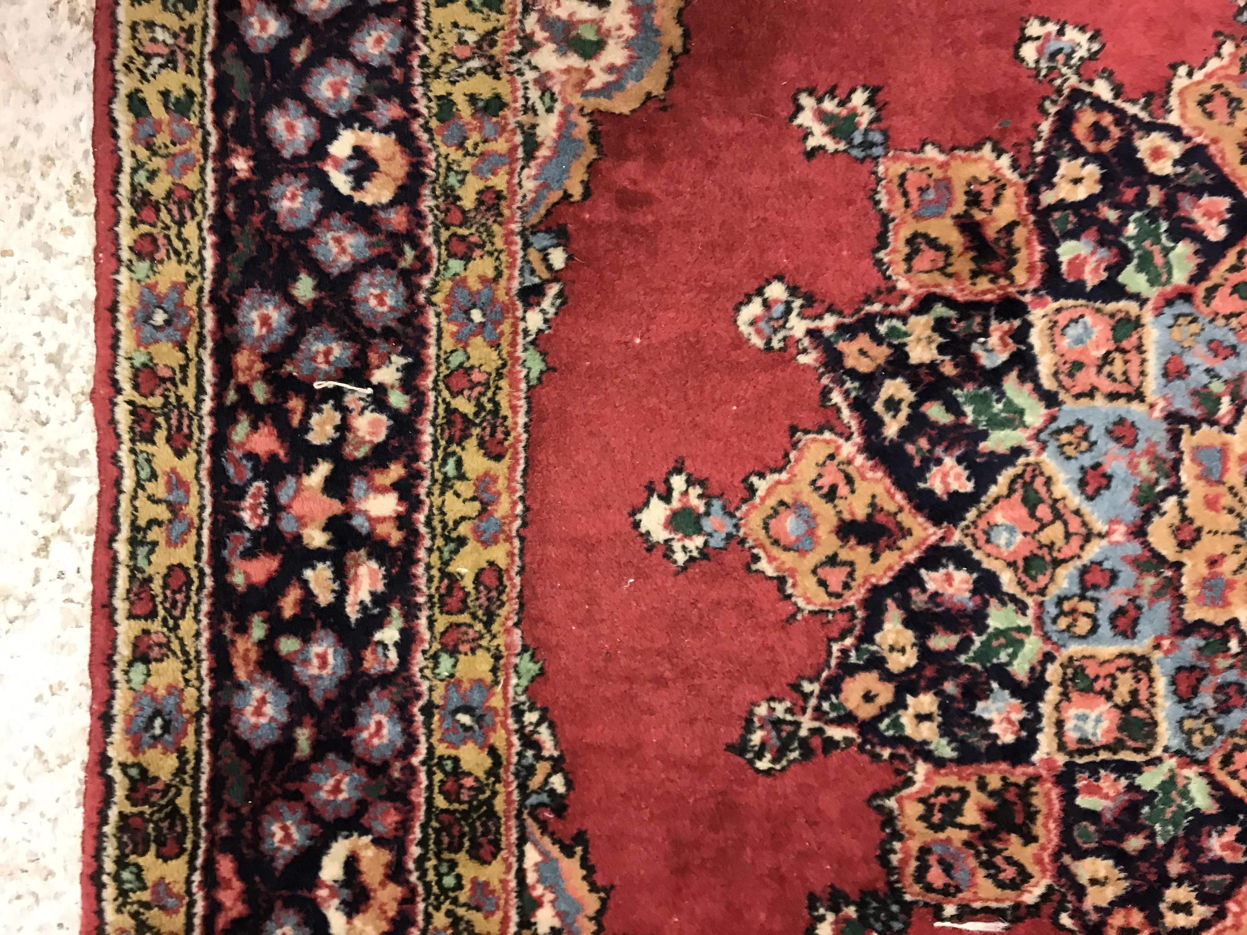 A pair of fine Oriental rugs, the central panels set with floral decorated circular medallion on a - Image 14 of 41