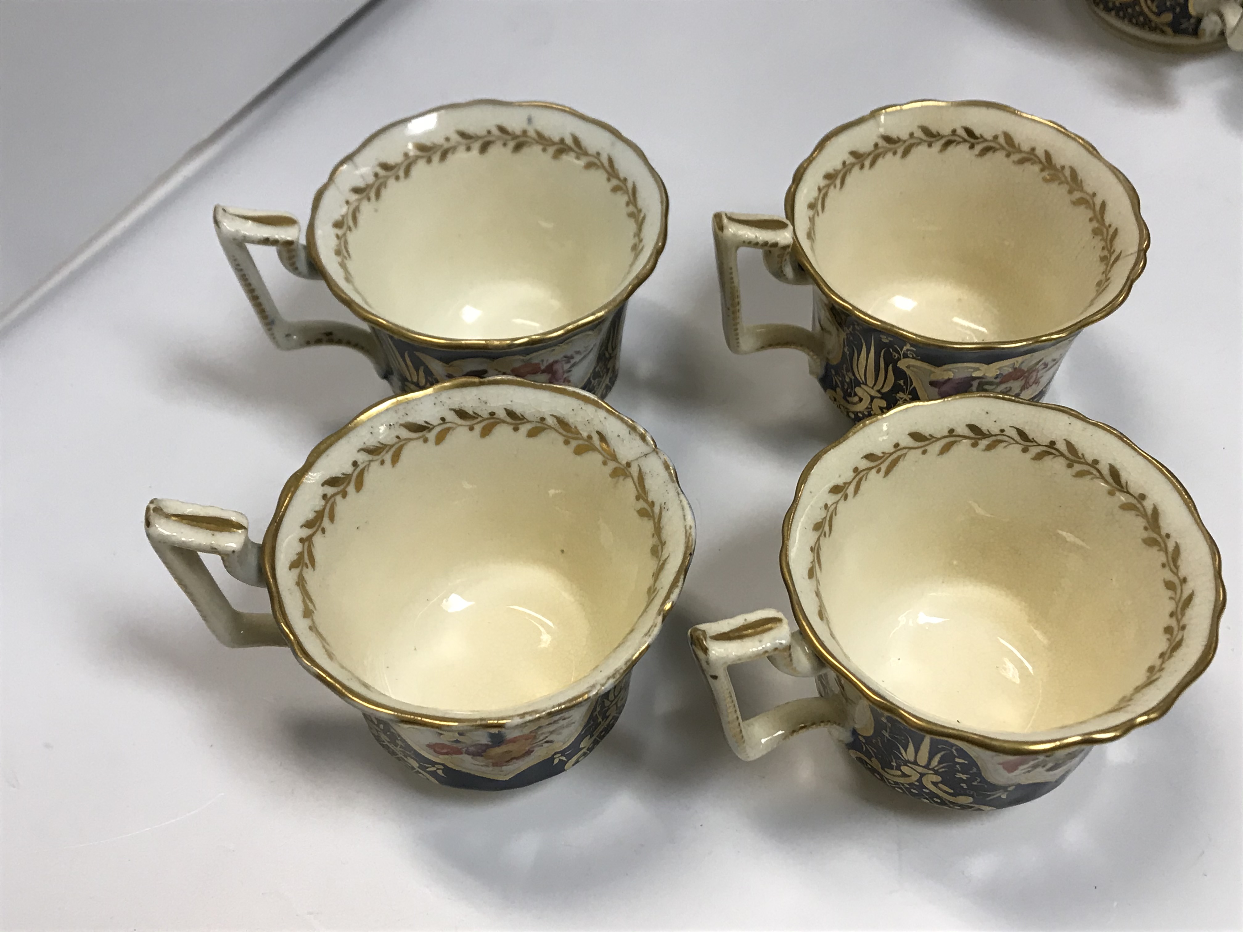 A 19th Century Staffordshire pottery part tea set, royal blue banded and gilt lined with panels of - Image 26 of 45