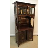 An early 20th Century mahogany and inlaid display cabinet in the manner of Shapland & Petter of