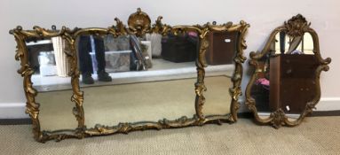 An early 20th Century gilt and gesso framed three glass overmantel mirror, with scrolling acanthus