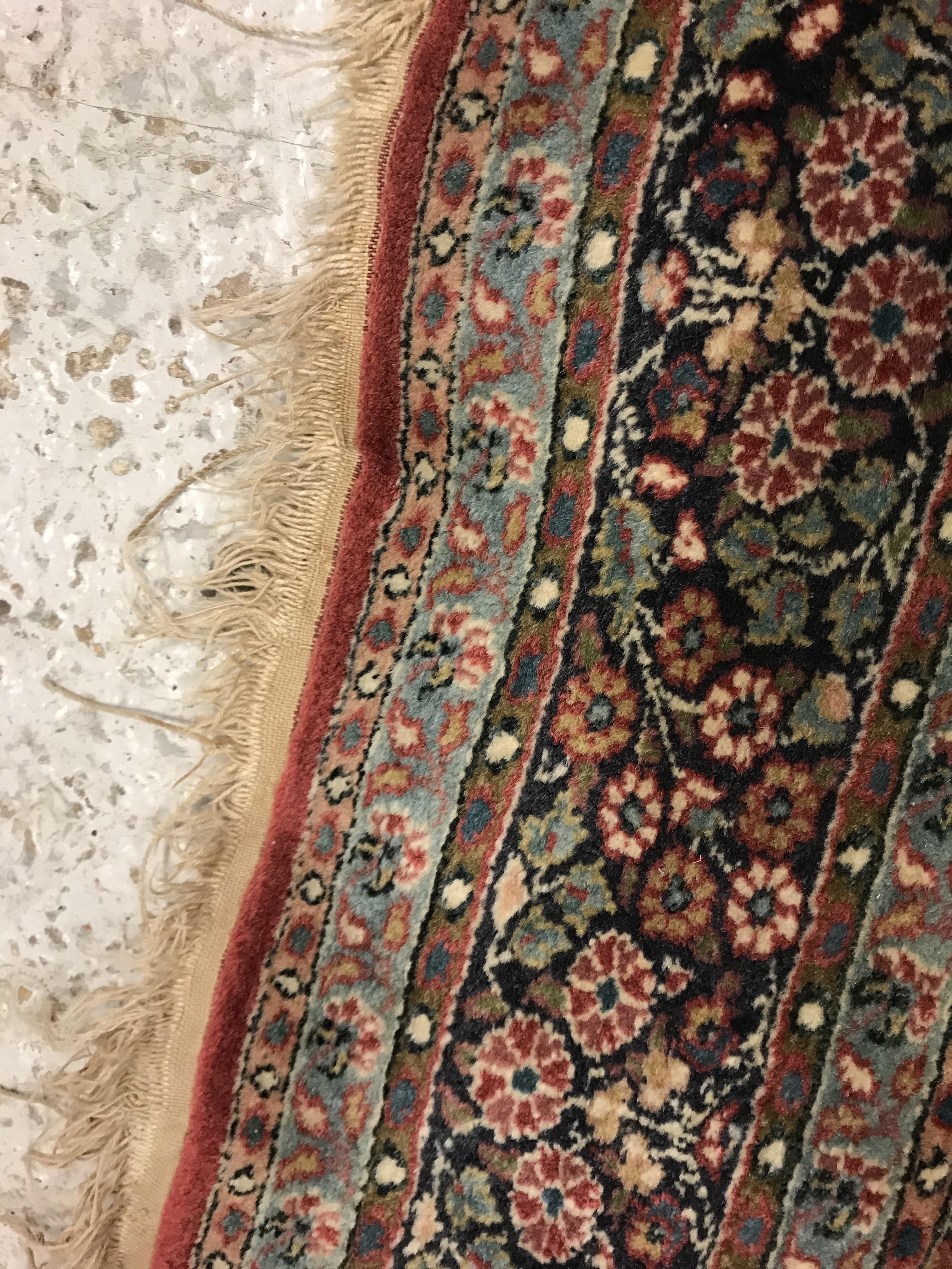 A pair of fine Oriental rugs, the central panel set with floral decorated circular medallion on a - Image 14 of 48