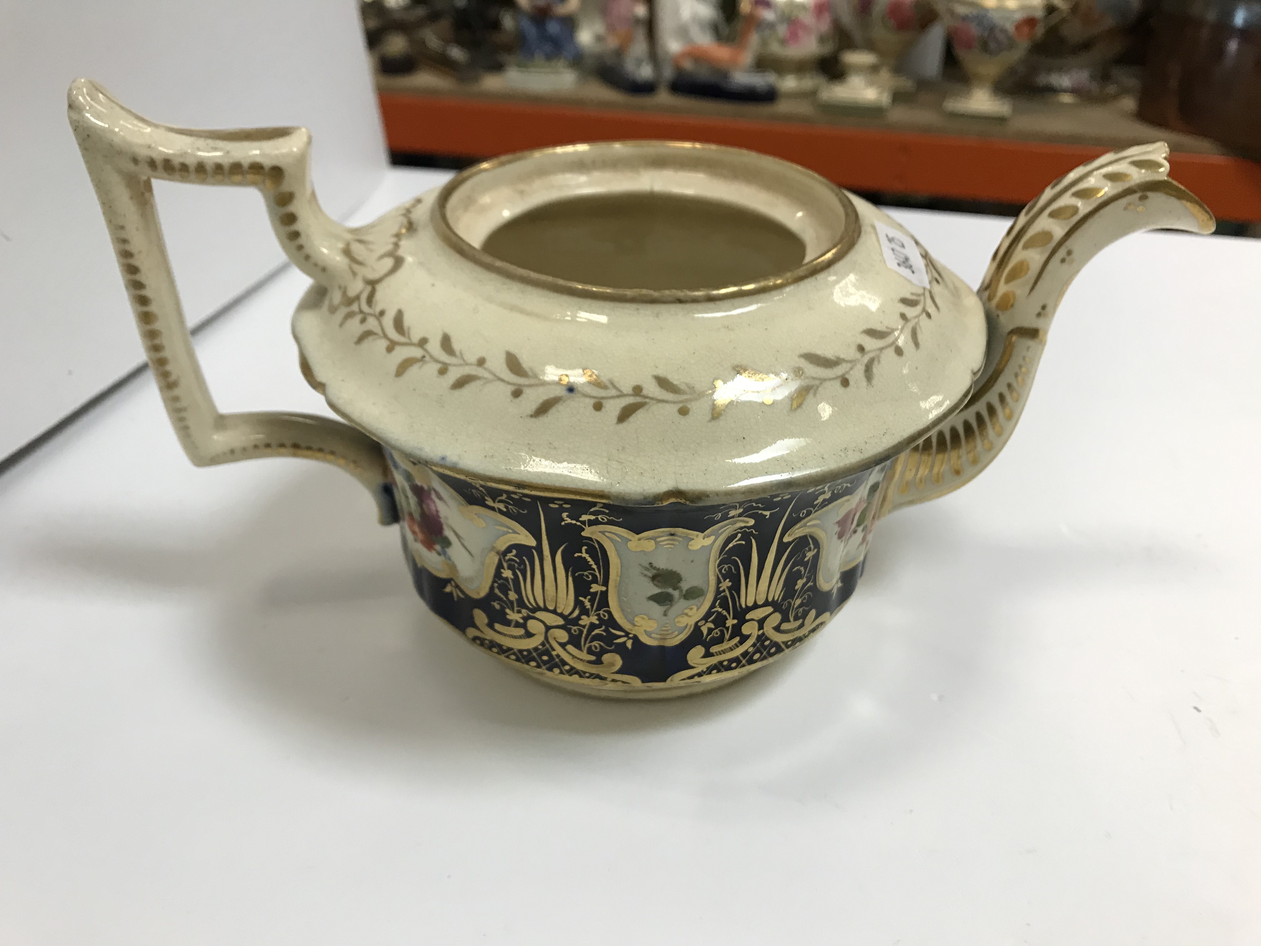 A 19th Century Staffordshire pottery part tea set, royal blue banded and gilt lined with panels of - Image 5 of 45