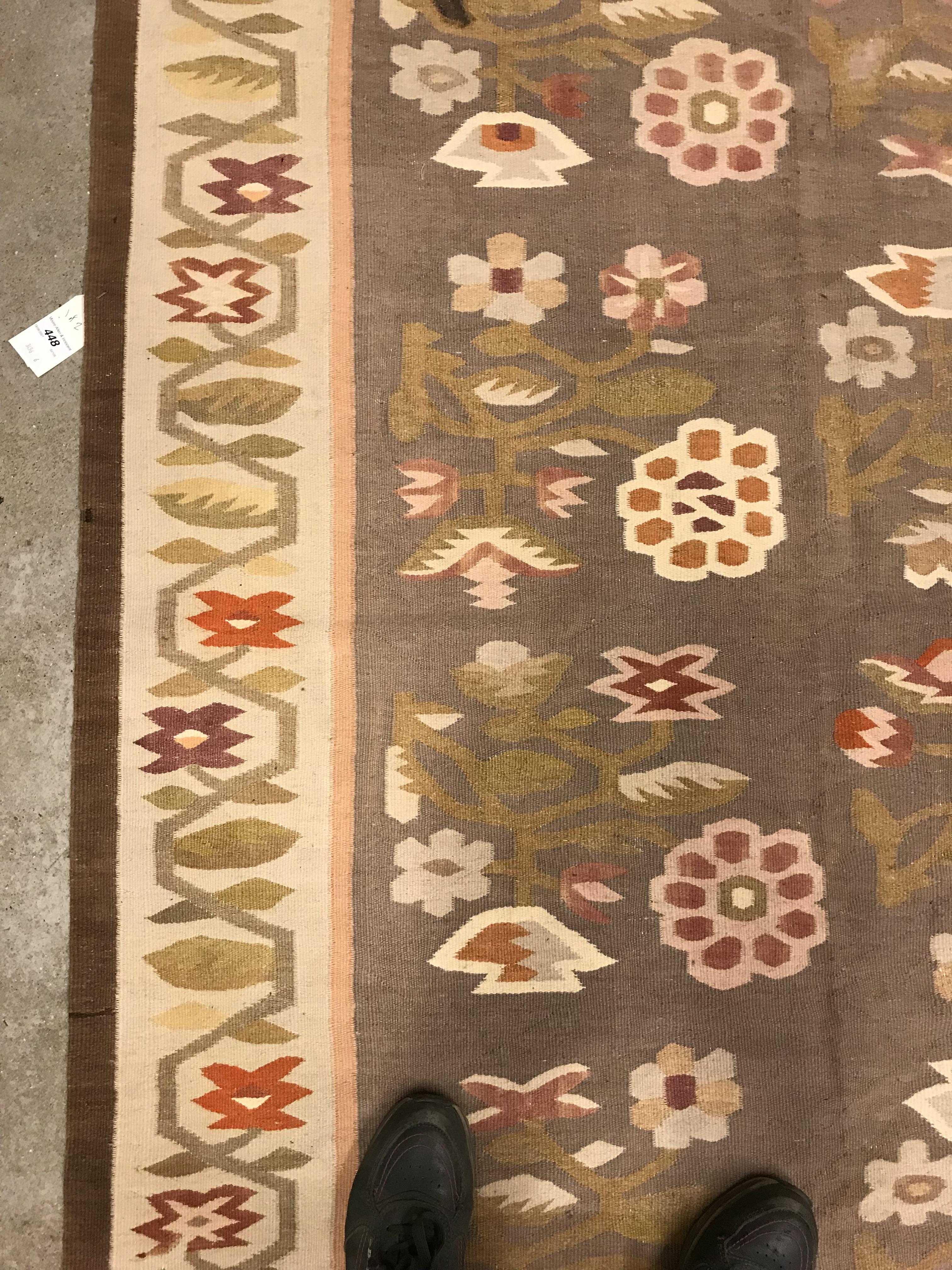 A Kelim rug, the central panel set with floral sprays on a mushroom ground, within a stepped border, - Image 5 of 16