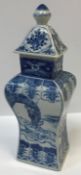 A Chinese blue and white rectangular vase of baluster form, decorated with figures, flowers and