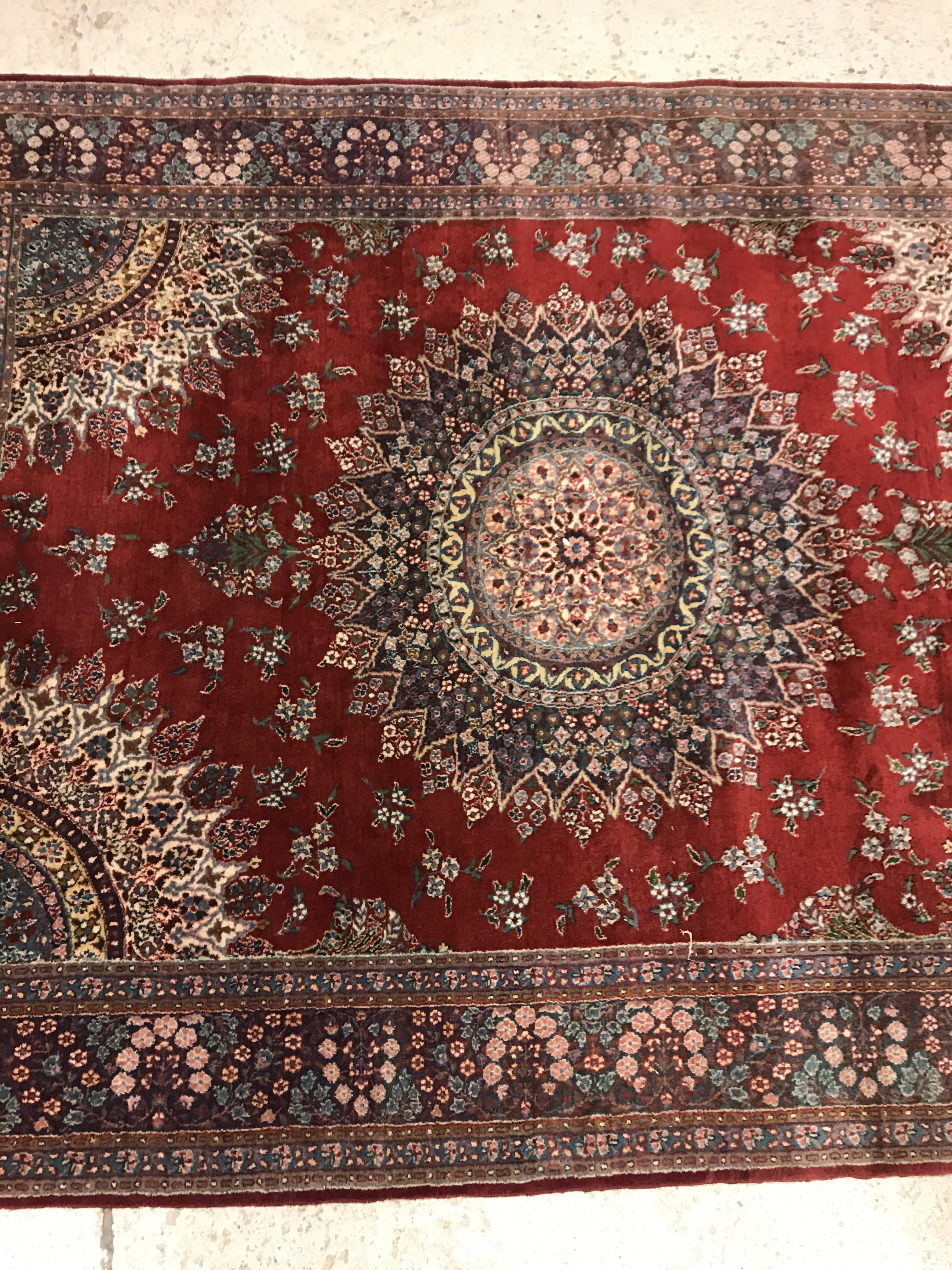 A pair of fine Oriental rugs, the central panels each set with floral decorated circular medallion - Image 9 of 41