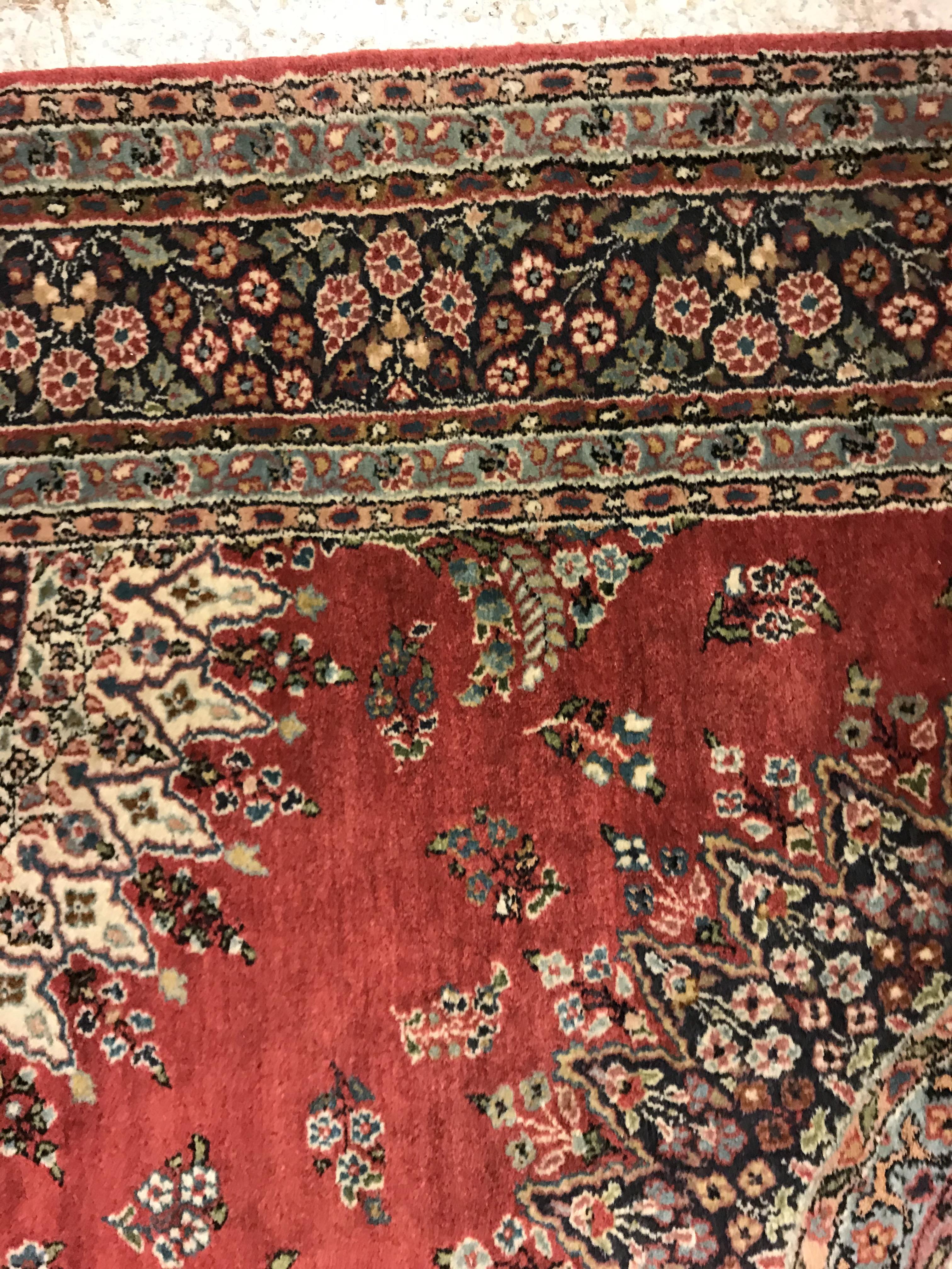 A pair of fine Oriental rugs, the central panel set with floral decorated circular medallion on a - Image 25 of 48