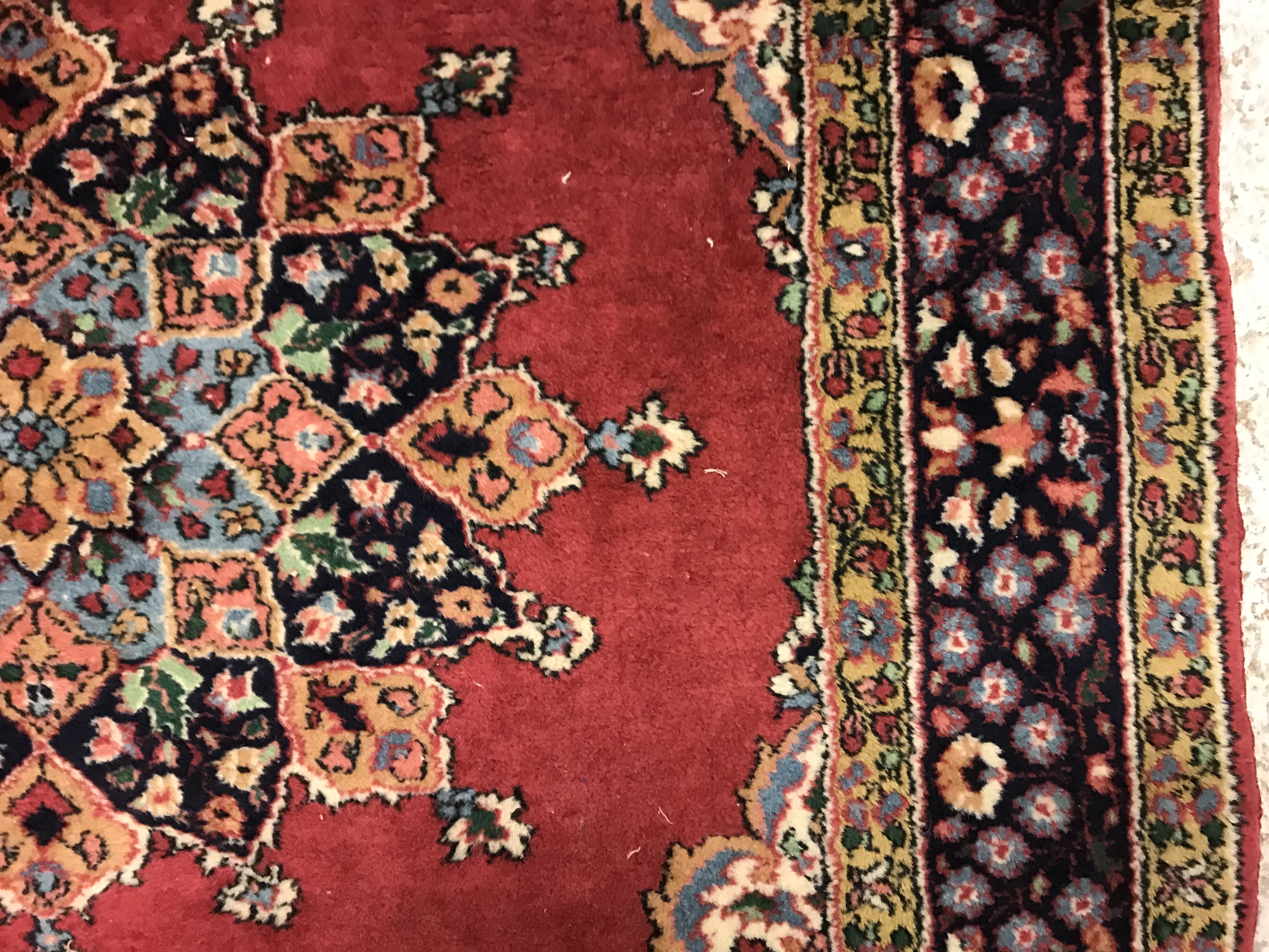 A pair of fine Oriental rugs, the central panels set with floral decorated circular medallion on a - Image 34 of 41