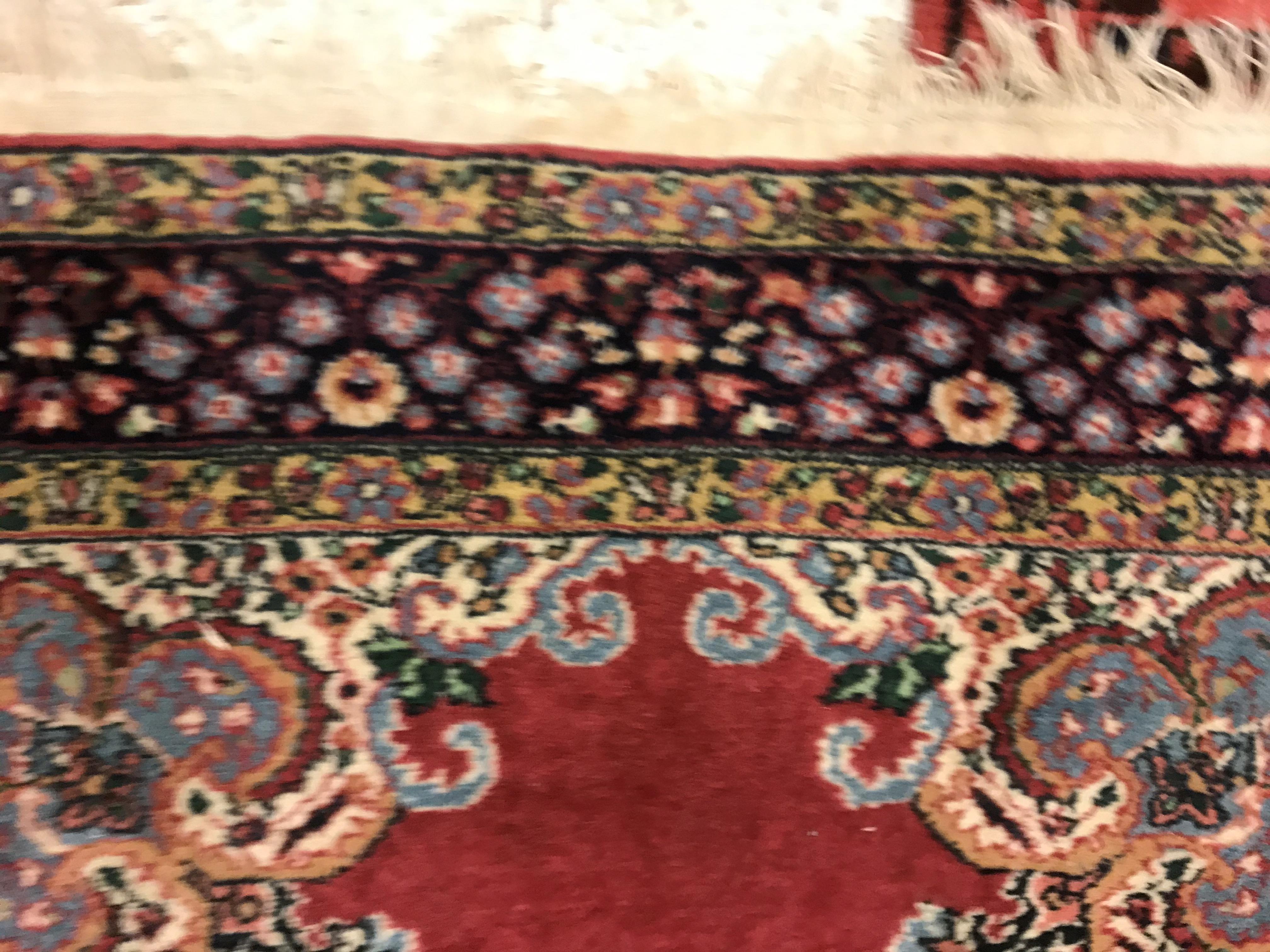 A pair of fine Oriental rugs, the central panels set with floral decorated circular medallion on a - Image 7 of 41