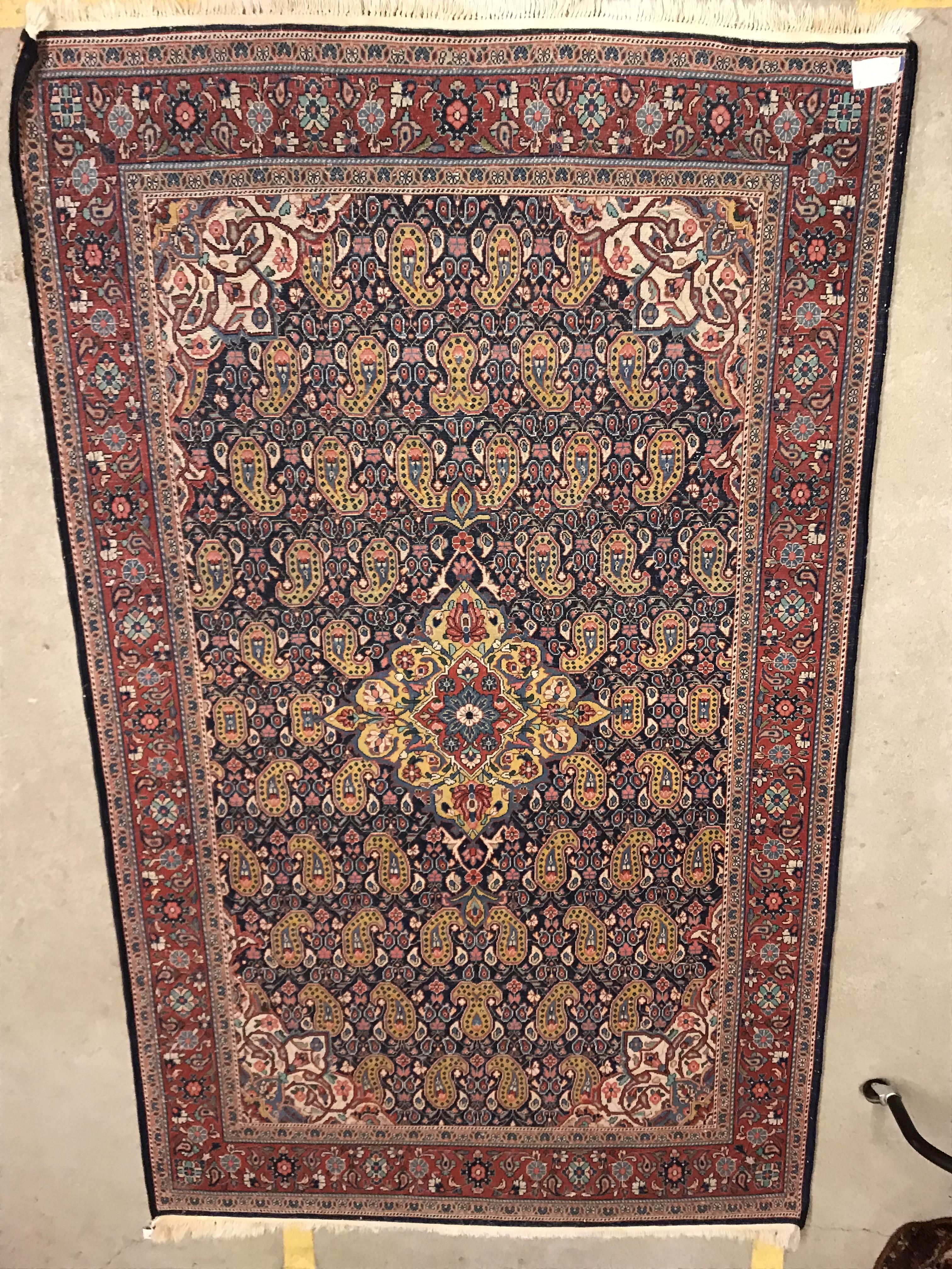 A Kashan carpet, the central panel set with floral decorated medallion on a dark blue hook decorated - Image 13 of 14