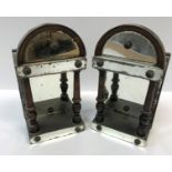 A pair of 19th Century mahogany and mirrored domed wall brackets of small proportions with column