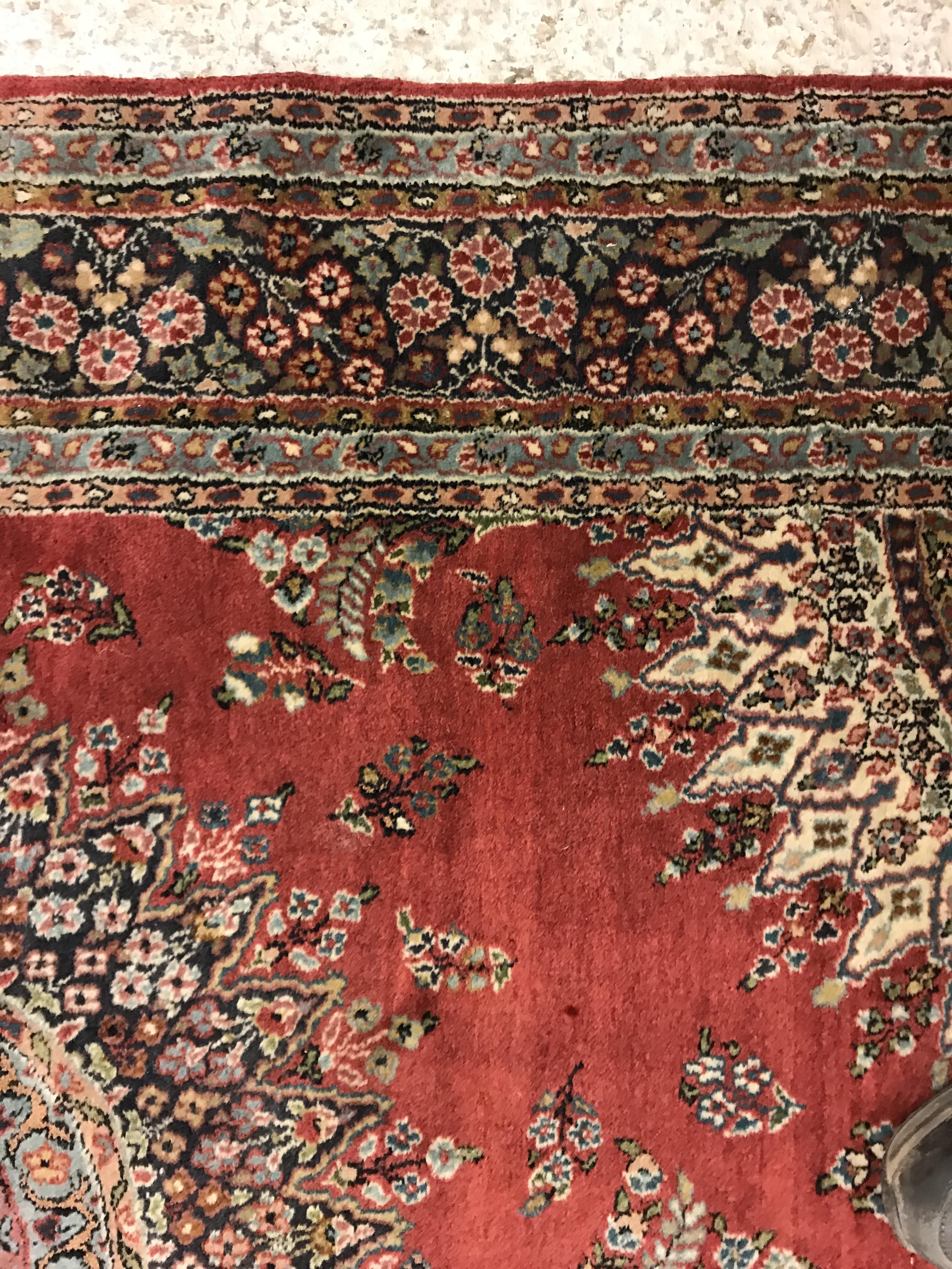 A pair of fine Oriental rugs, the central panel set with floral decorated circular medallion on a - Image 19 of 48