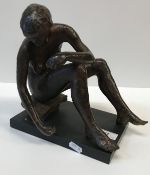 VINCENT BUTLER "Nude seated upon a stool", chocolate patinated bronze, signed and dated 1979, on a