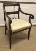A 19th Century Dutch mahogany and floral marquetry inlaid carver chair with upholstered seat on