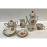 A Herend oxide red decorated duet coffee set comprising teapot, cream jug, sugar basin and cover,