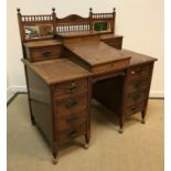A Victorian mahogany double pedestal desk, the raised superstructure with mirrored back and