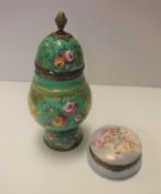 A late 18th / early 19th Century South Staffordshire type enamel jar with hinged cover, the domed