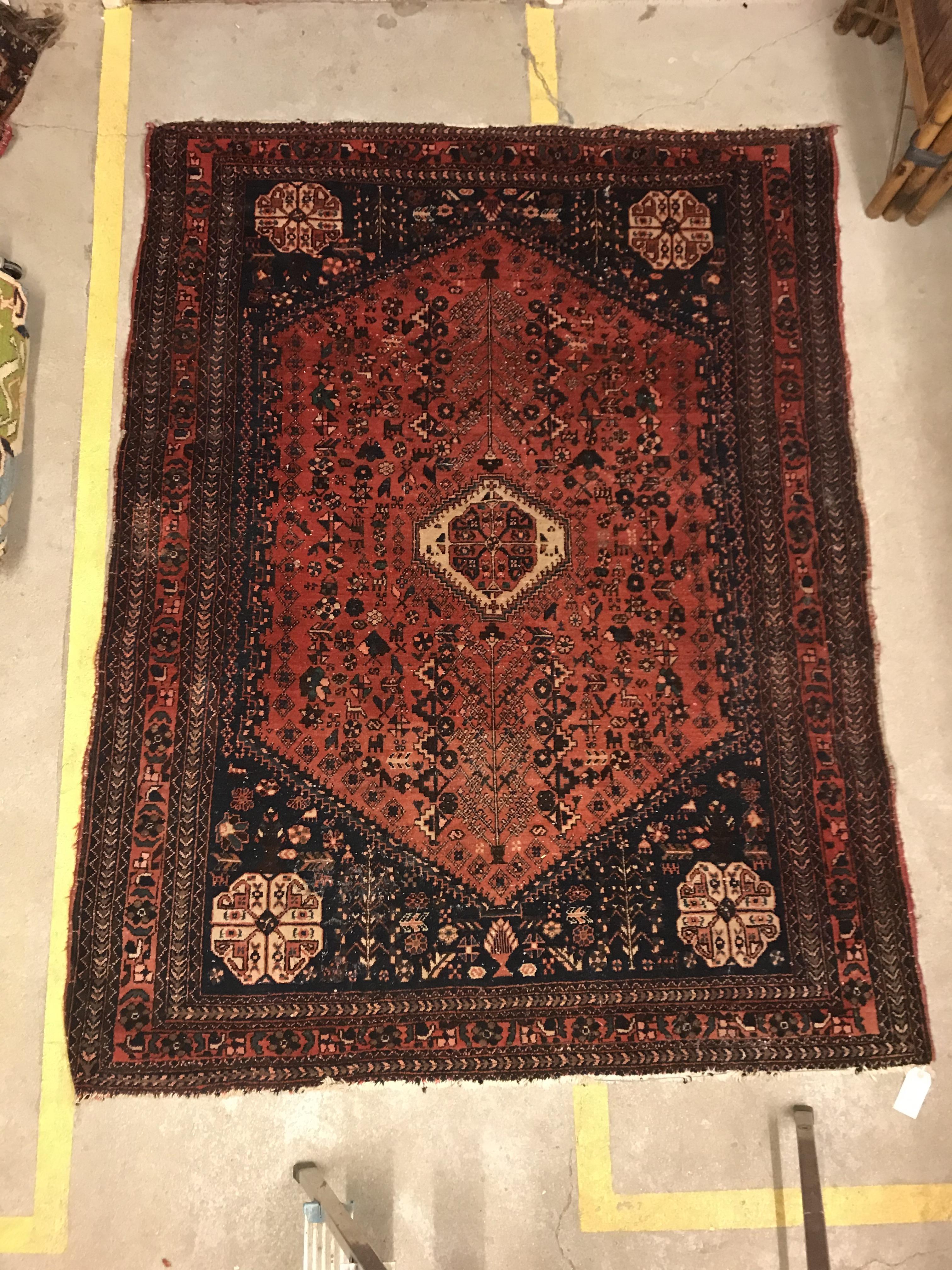 A Caucasian rug, the central panel set with three repeating medallions on a pale blue ground, within - Image 14 of 33