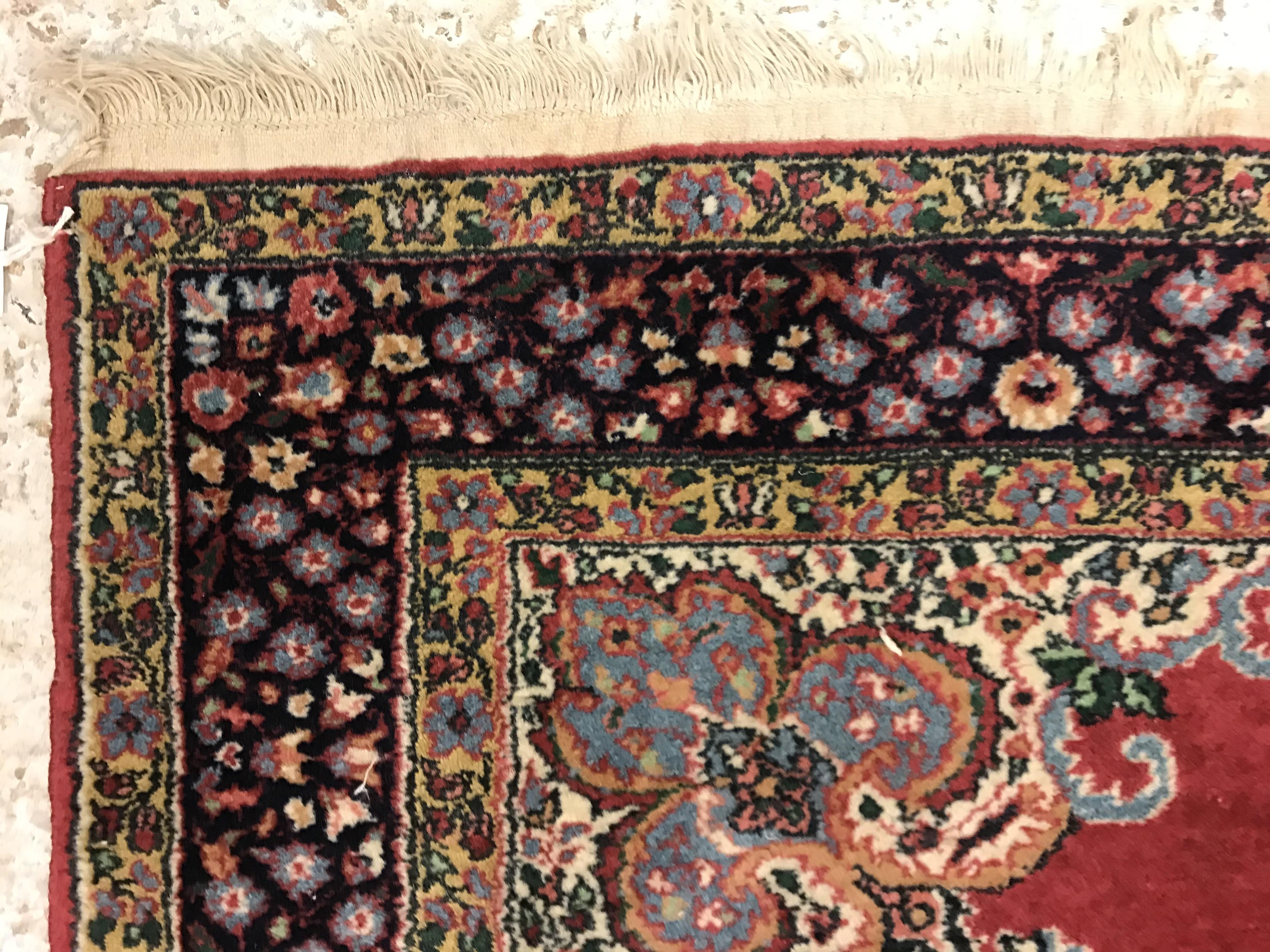 A pair of fine Oriental rugs, the central panels set with floral decorated circular medallion on a - Image 8 of 41