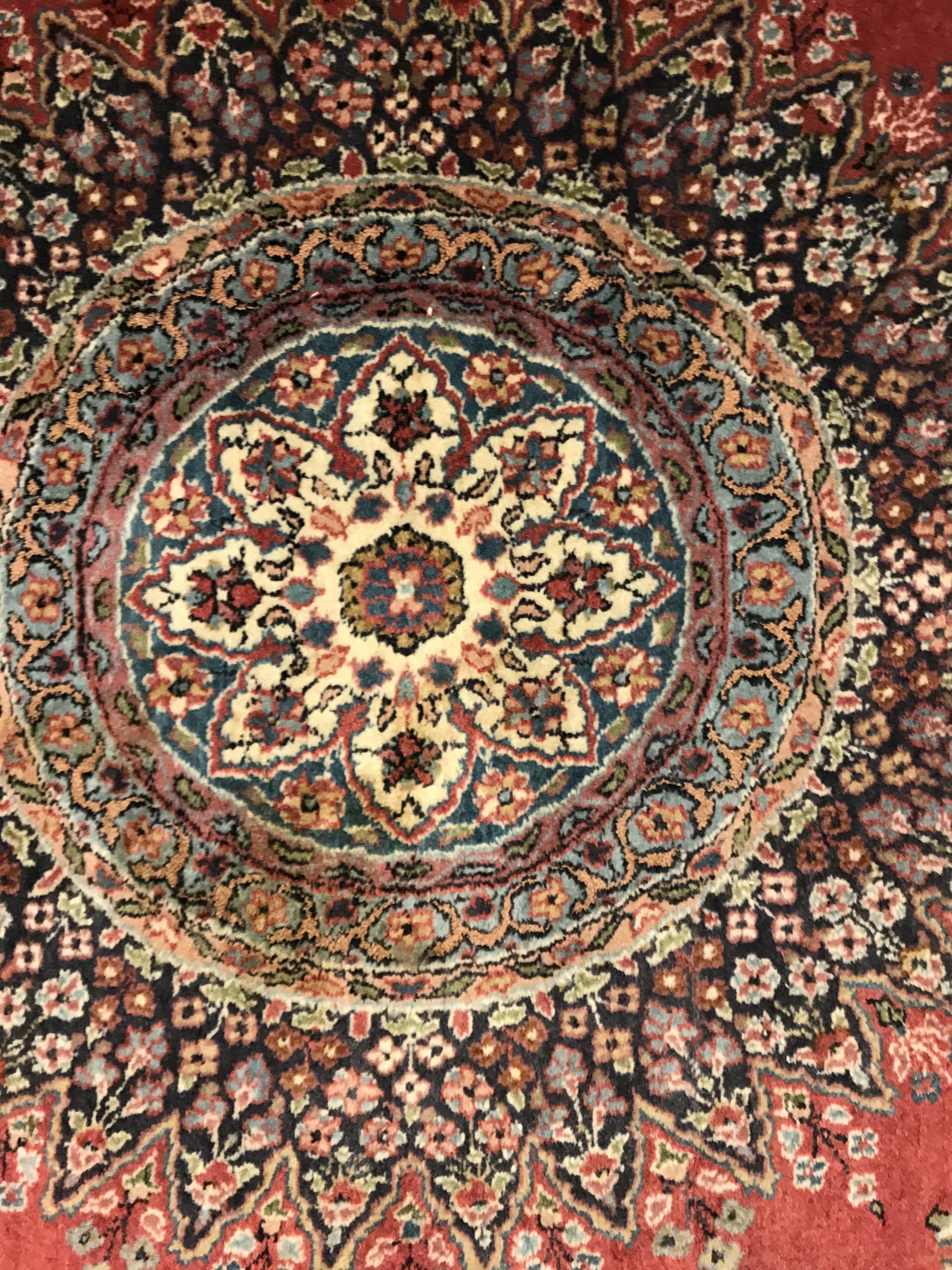 A pair of fine Oriental rugs, the central panel set with floral decorated circular medallion on a - Image 23 of 48