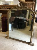 A 19th Century giltwood and gesso framed overmantel mirror, the surmount with flaming torch and