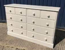 A modern painted pine chest of four short over six long drawers, 150 cm wide x 44 cm deep x 97 cm