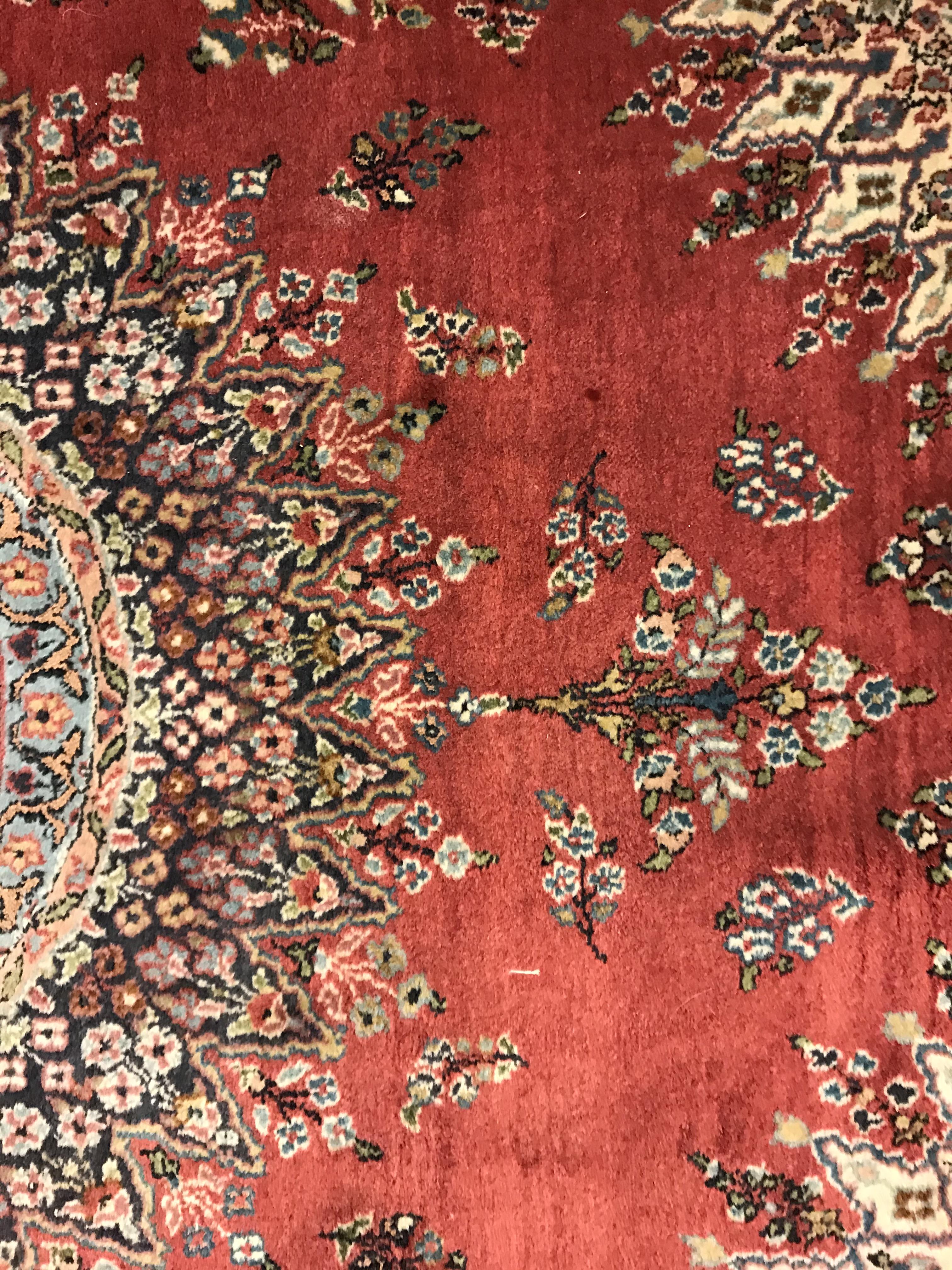 A pair of fine Oriental rugs, the central panel set with floral decorated circular medallion on a - Image 20 of 48