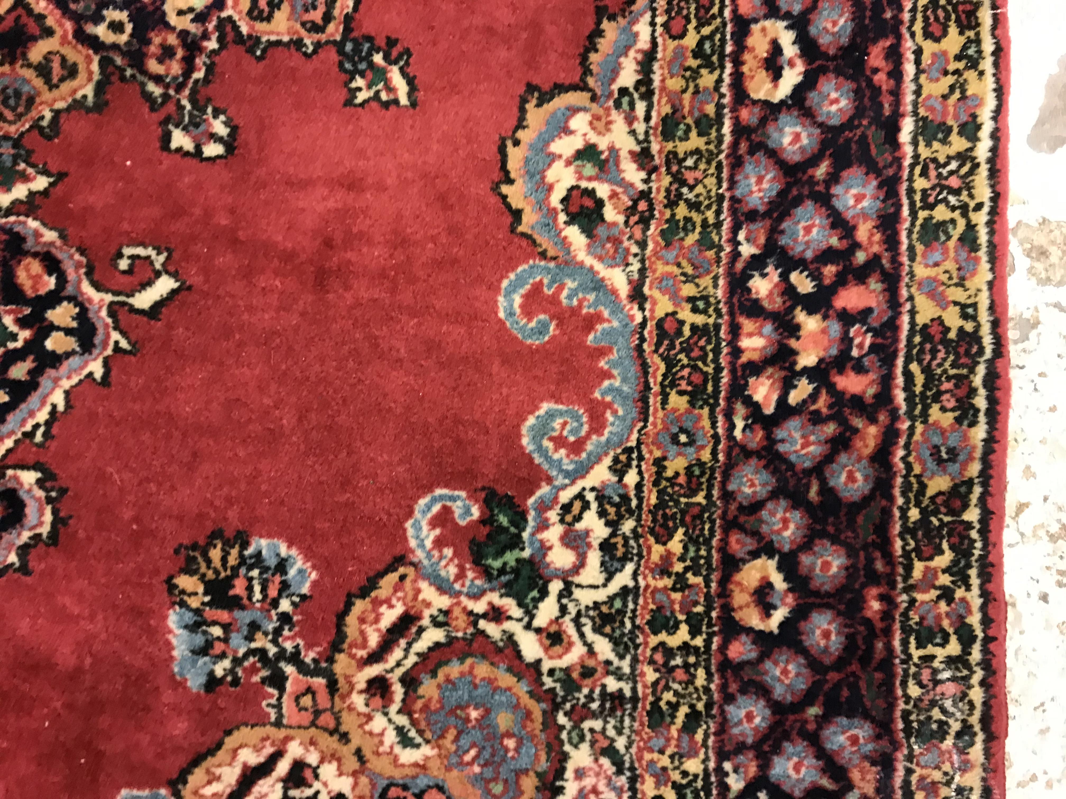 A pair of fine Oriental rugs, the central panels set with floral decorated circular medallion on a - Image 17 of 41