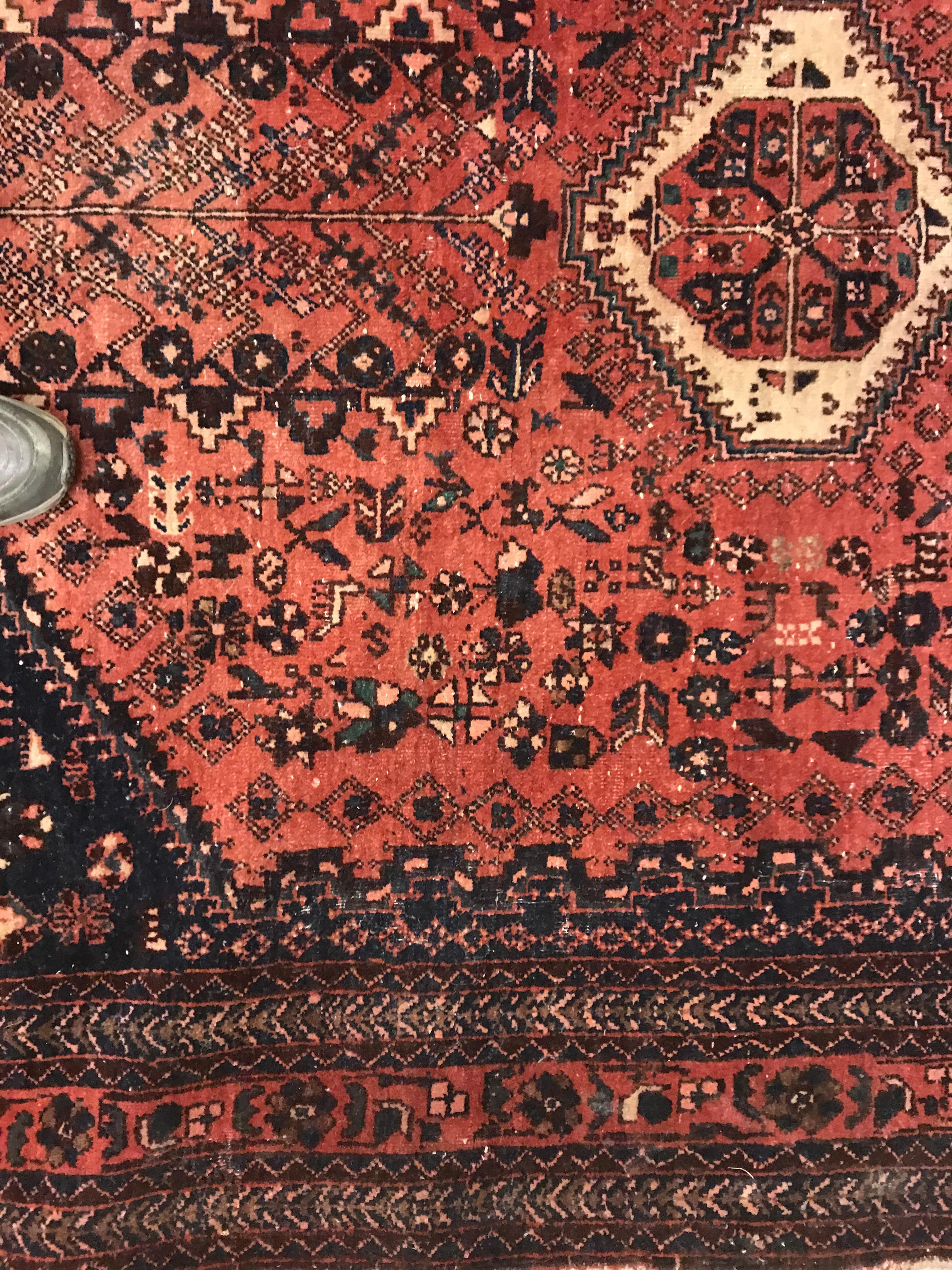 A Caucasian rug, the central panel set with three repeating medallions on a pale blue ground, within - Image 17 of 33