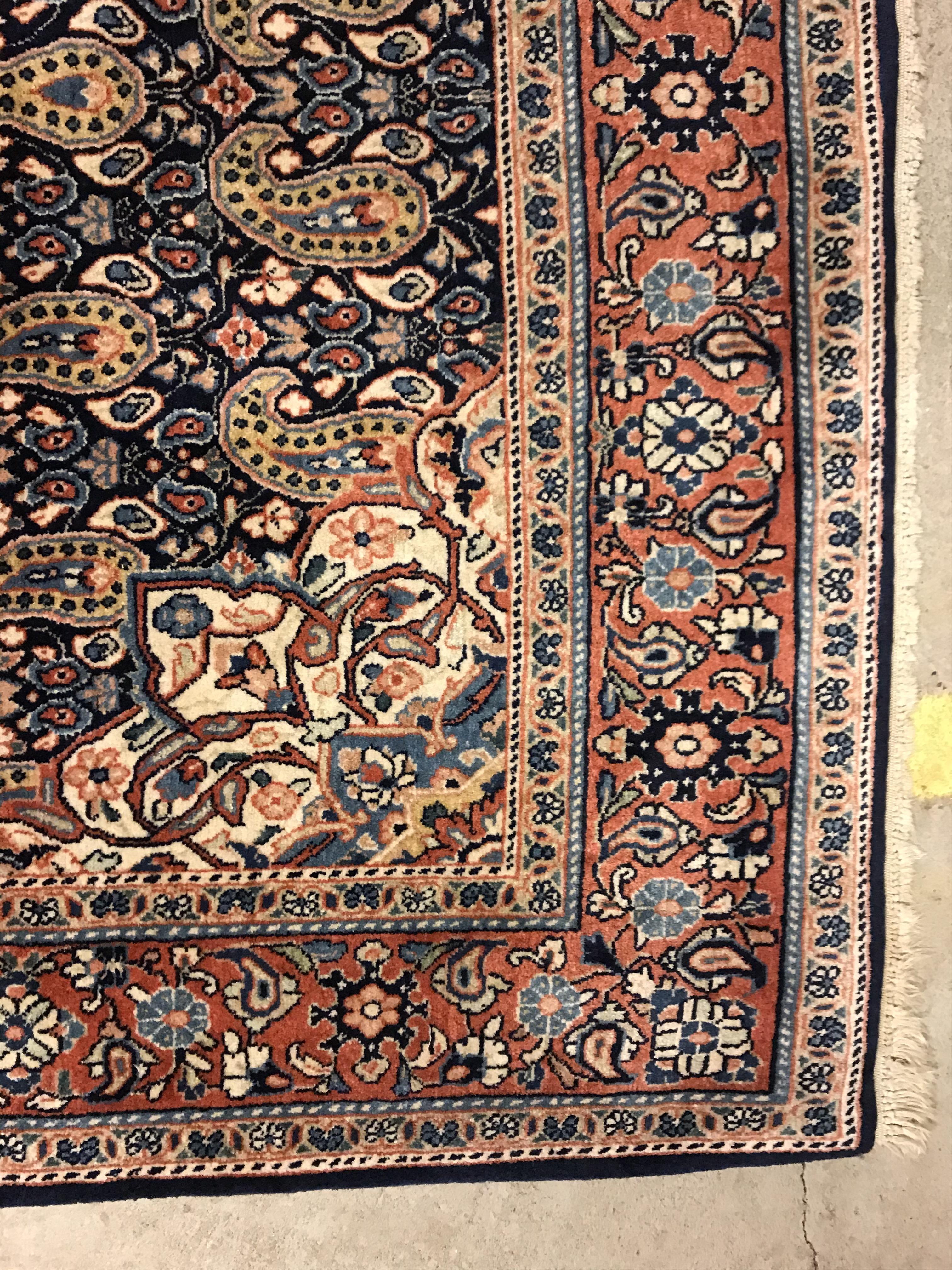 A Kashan carpet, the central panel set with floral decorated medallion on a dark blue hook decorated - Image 12 of 14