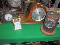 A mahogany and inlaid cased mantel clock with silvered dial and Arabic numerals, a small oak cased