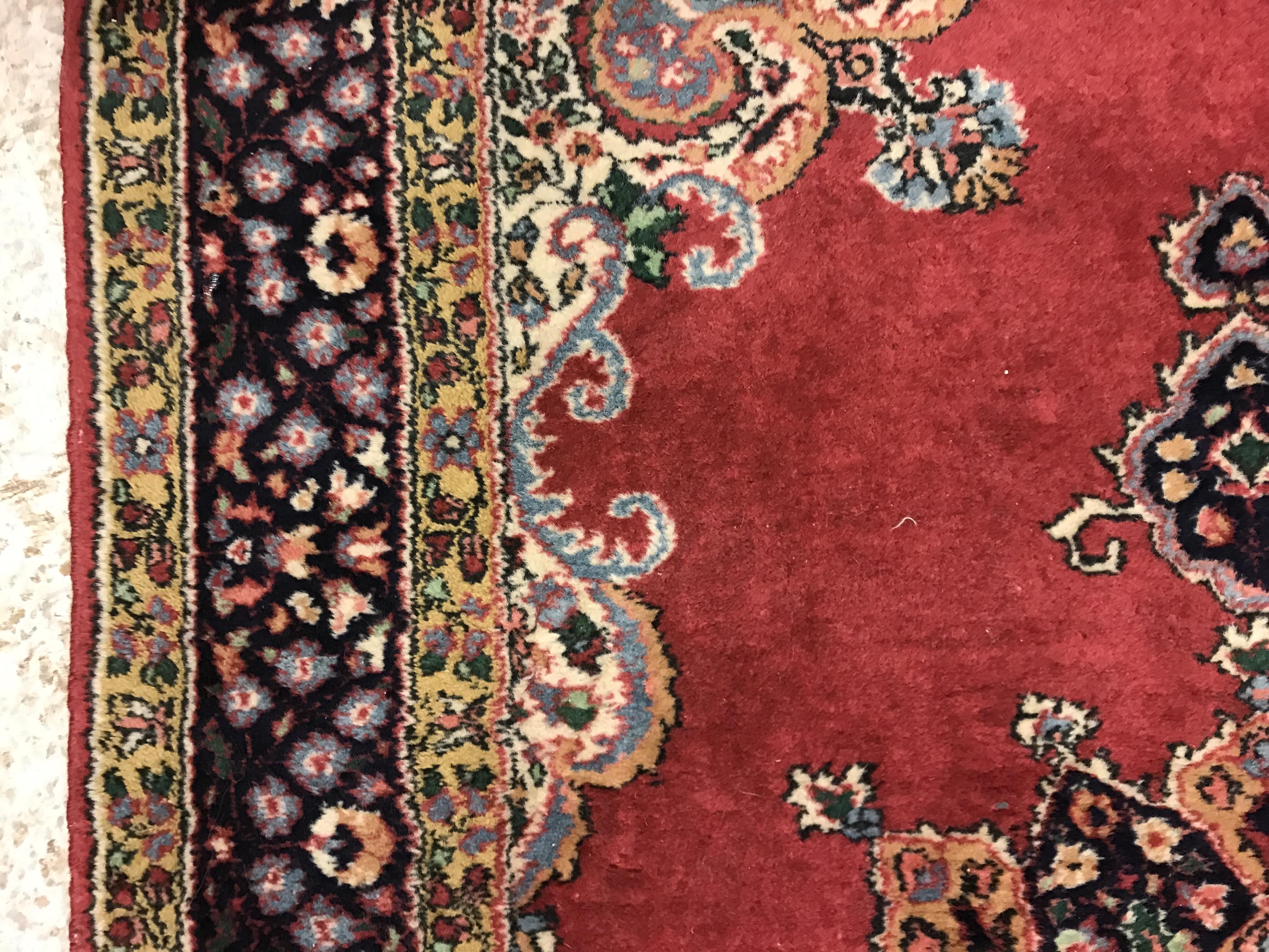 A pair of fine Oriental rugs, the central panels set with floral decorated circular medallion on a - Image 9 of 41