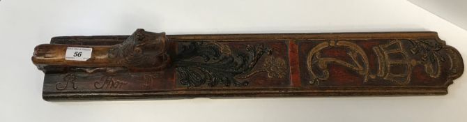 An 18th Century Scandinavian carved and painted wooden "mangle board" (aka mangling/smoothing board)