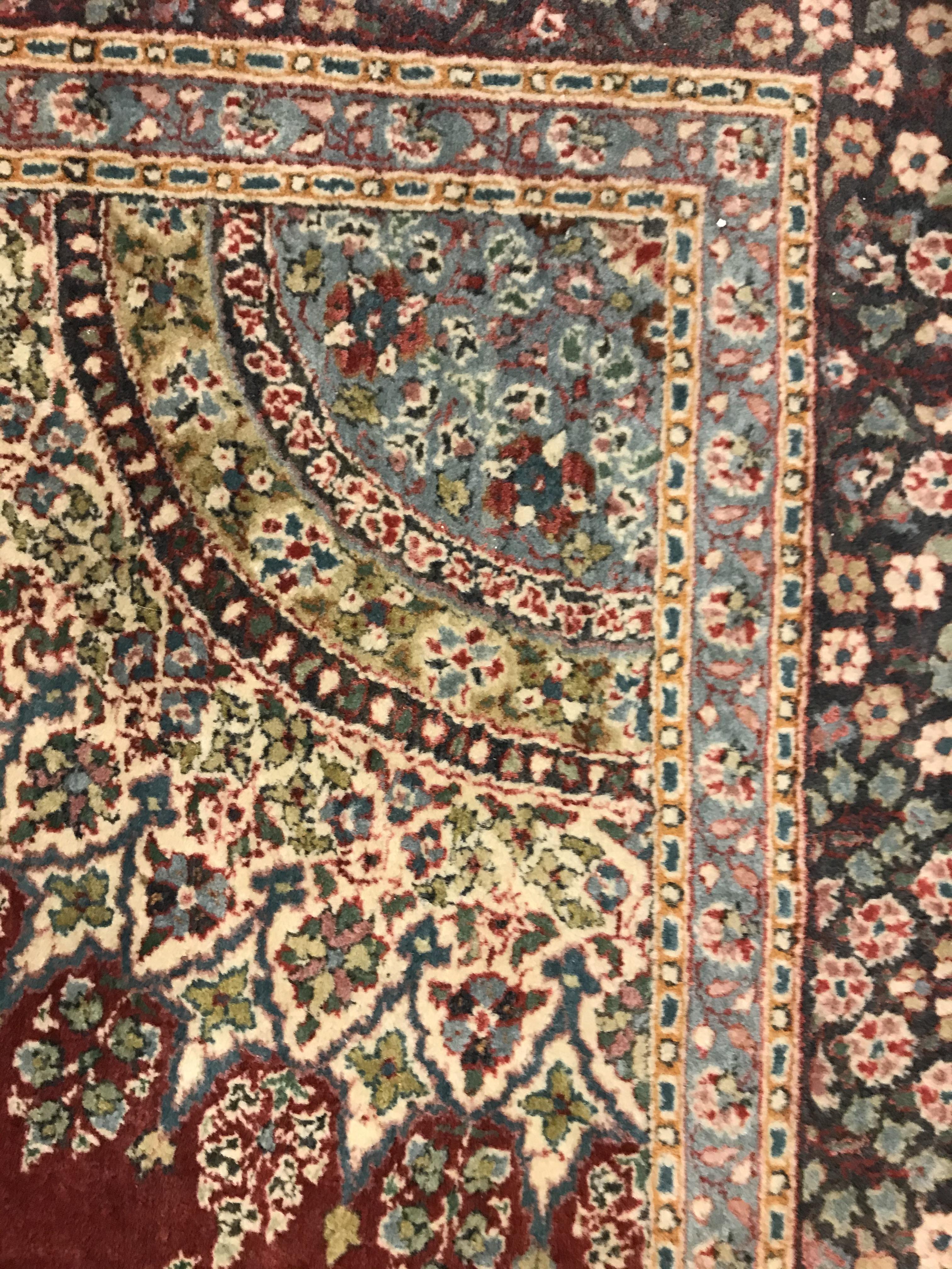 A pair of fine Oriental rugs, the central panels each set with floral decorated circular medallion - Image 35 of 41