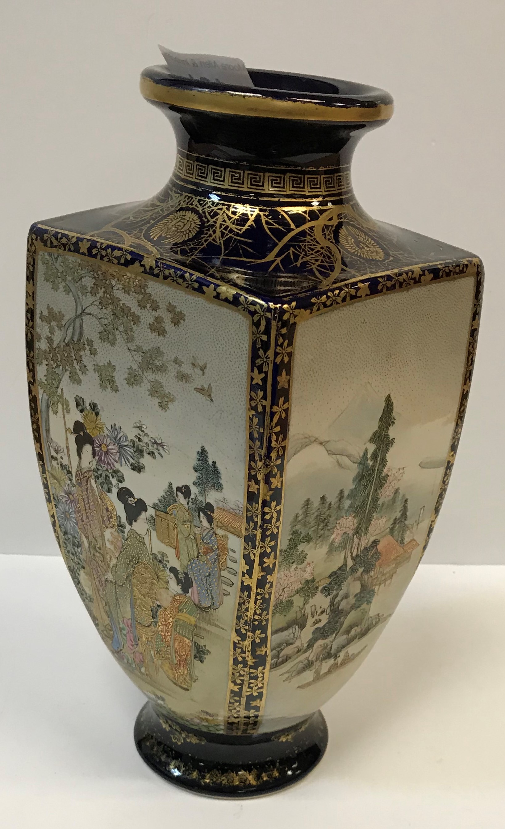 A Meiji Period Japanese Satsuma vase of tapering square form, decorated with panels of figures in - Image 2 of 3
