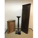 A Victorian pitch pine hanging corner cupboard with single fielded panelled door, 70 cm wide x 92 cm