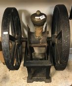 A Victorian cast iron and brass double fly wheel coffee grinder, 70 cm high