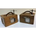 Two oak cased Benzing racing pigeon clocks, 21 cm x 16.5 cm x 13 cm high