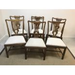 A set of six modern Provincial Chippendale style vase back dining chairs with upholstered seats on