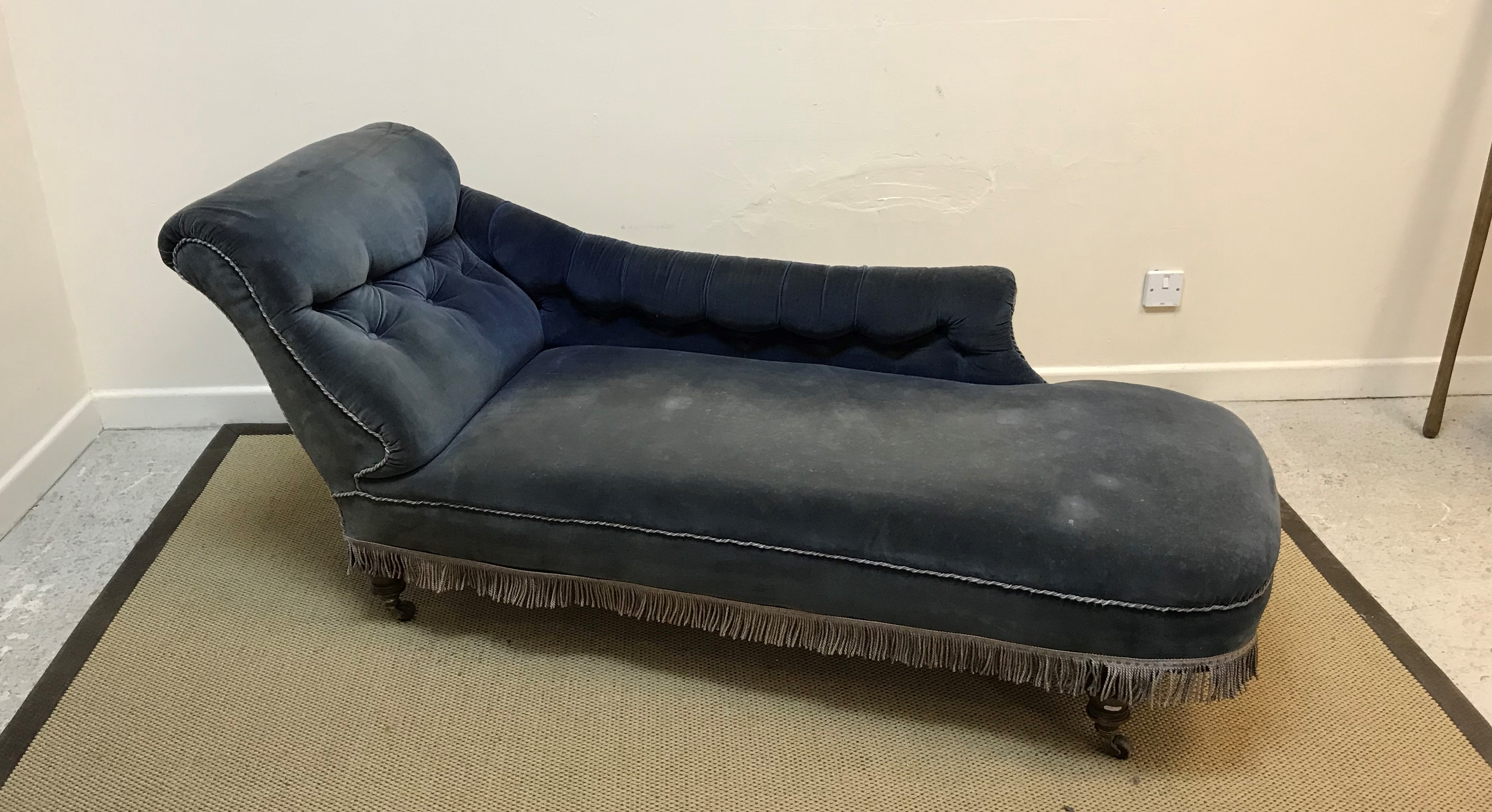 A Victorian buttoned upholstered chaise longue by James Shoolbred of Tottenham Court Road, London,