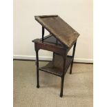 A 19th Century padouk (or padauk) wood reading table, the double ratchet top with moulded edge and