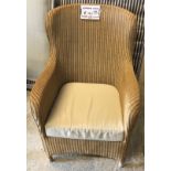 A Marks and Spencer cane work wing back conservatory chair with cushion