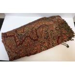 A modern Paisley design red ground shawl / table cover, 432 cm x 500 cm approx