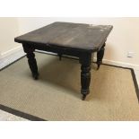 A Victorian oak extending dining table of square form, 104 cm x 104 cm x 75 cm high, an early to mid
