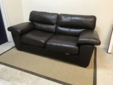 A modern brown leather upholstered two seat sofa on square tapered supports, approx 208 cm wide x 99